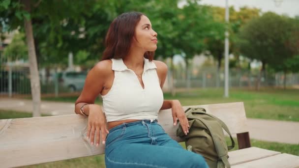 Lovely Tanned Woman Long Brown Hair Wearing White Top Sitting — Vídeo de stock