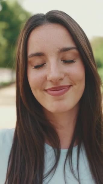 Vertical Video Close Young Smiling Woman Long Brown Hair Wearing — Vídeo de Stock