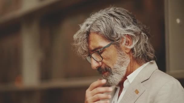 Close Profile Mature Businessman Beard Eyeglasses Wearing Gray Jacket Rubs — Vídeos de Stock