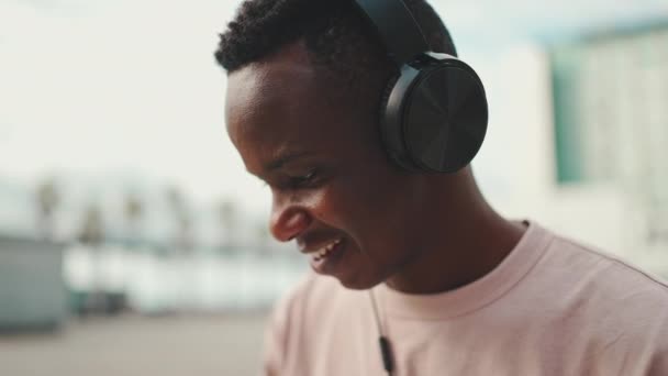 Close Profile Young African Student Sitting University Listening Music Headphones — 비디오