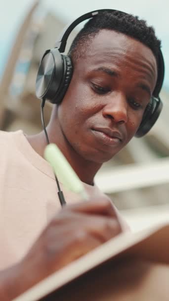 Vertical Video Young African Student Sitting University Taking Notes While — Stock video