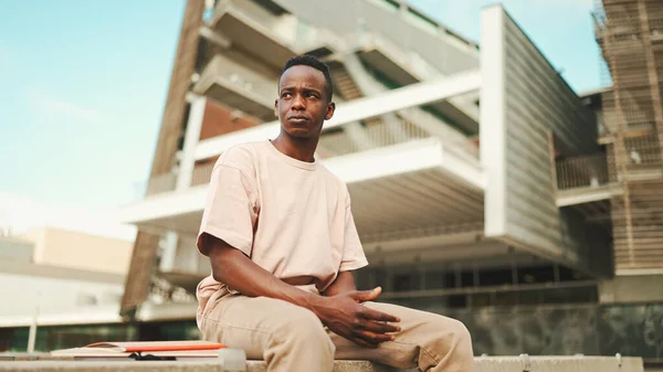 Smiling Young African Student Sitting University Looking — Φωτογραφία Αρχείου