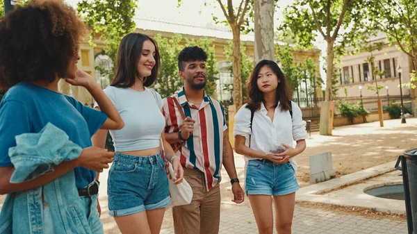 Happy Multiethnic Young People Walk Embracing Summer Day Outdoors Group — Stock Fotó
