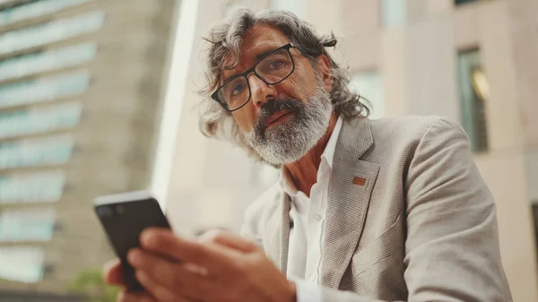 Mature Businessman Beard Eyeglasses Wearing Gray Jacket Holds Cellphone His — Fotografia de Stock