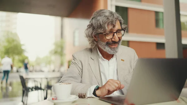Mature Businessman Beard Eyeglasses Wearing Gray Jacket Sits Drinks Coffee — Fotografia de Stock