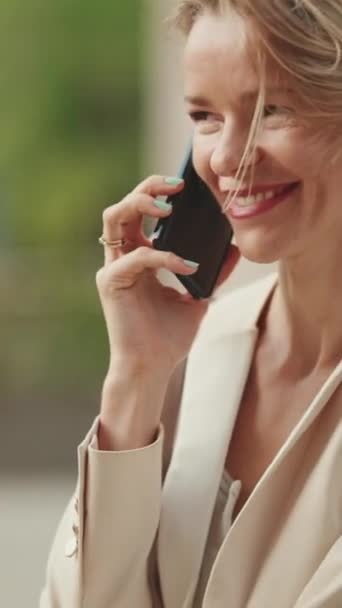 Vertical Video Happy Businesswoman Blond Hair Talking Cellphone Good Deal — Vídeos de Stock