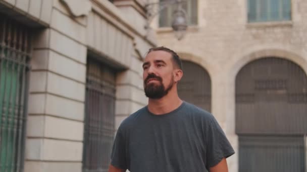 Young Smiling Man Beard Walking Looking Old City Background — Stock Video