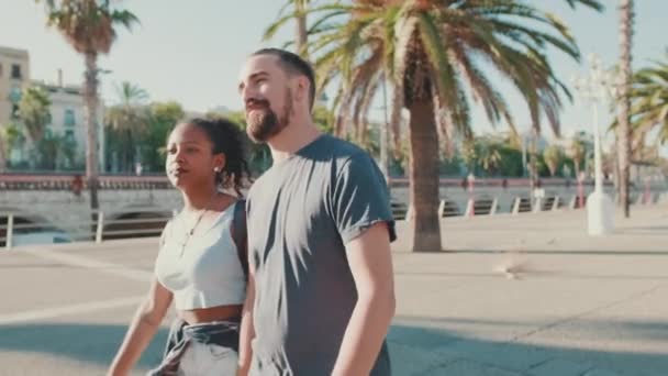 Happy Interracial Couple Walking Talking Smiling Street Holding Hands — Video