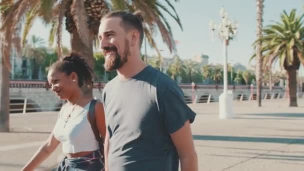 Happy Interracial Couple Walking Talking Smiling Street Holding Hands — стоковое видео