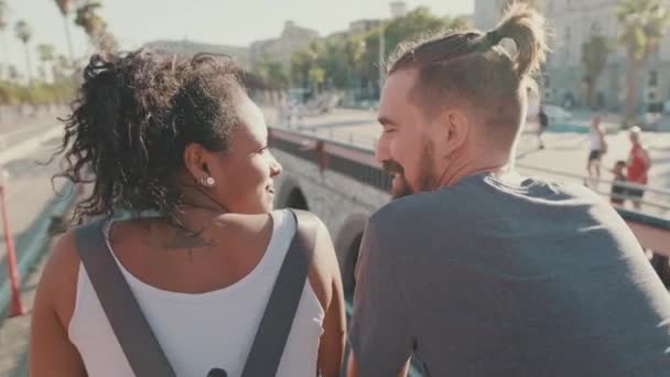 Close Interracial Couple Standing Bridge Back View — Stockvideo