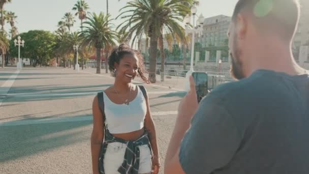 Smiling Interracial Couple Man Takes Picture Video Woman Phone — Stock videók