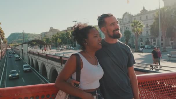 Happy Interracial Couple Talking While Standing Bridge — Vídeo de Stock