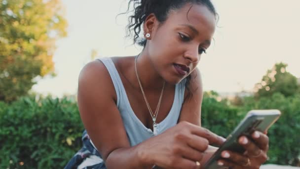 Close Smiling Young Mixed Race Woman Sitting Park Bench Using — Vídeos de Stock