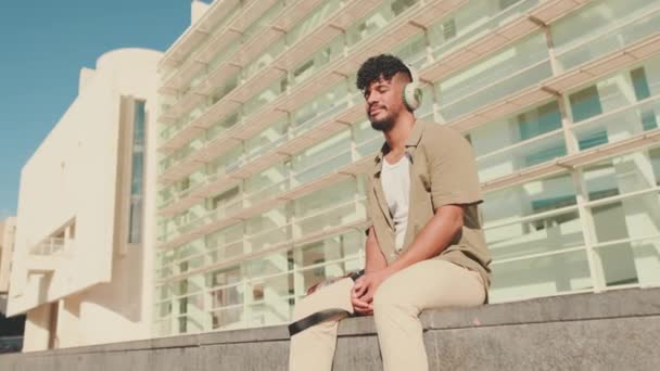 Young Male Student Dressed Olive Colored Shirt Sits Next University — Vídeo de Stock