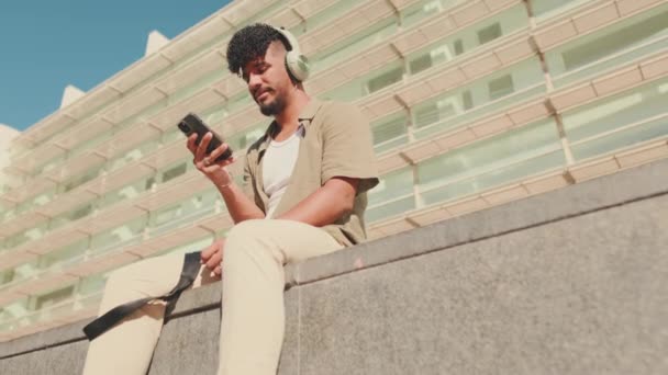 Young Male Student Dressed Olive Color Shirt Sits Next University — Vídeos de Stock