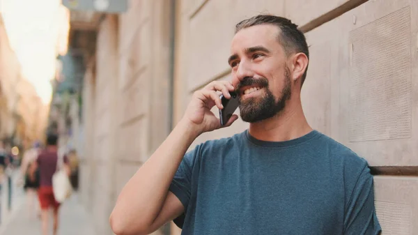 Close Young Man Beard Talking Cellphone Background Old City — Fotografia de Stock