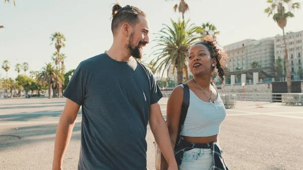 Happy Interracial Couple Walking Talking Smiling Street Holding Hands — Stok fotoğraf