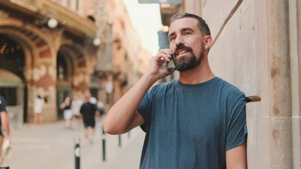 Close Young Man Beard Talking Cellphone Background Old City — 스톡 사진