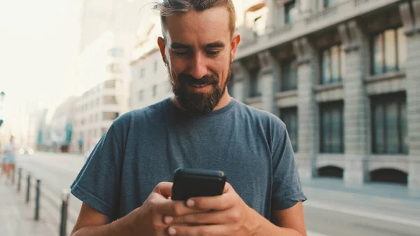 Young Man Beard Walks Street Using Cellphone — Foto Stock