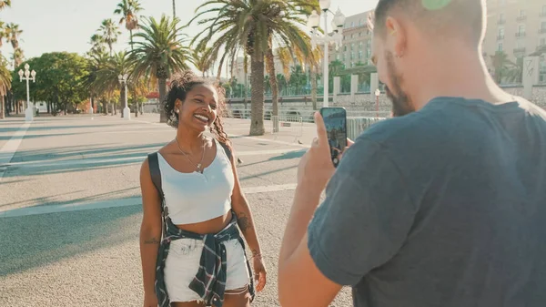 Smiling Interracial Couple Man Takes Picture Video Woman Phone — Foto de Stock