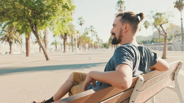 Young Smiling Man Beard Sits Rests Bench —  Fotos de Stock