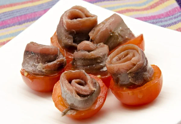 Anchovies with tomato — Stock Photo, Image