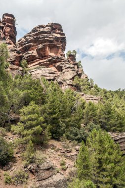 Mountains of Albarracin with trees clipart