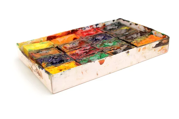 Tinta aquarela em uma caixa isolada em fundo branco — Fotografia de Stock