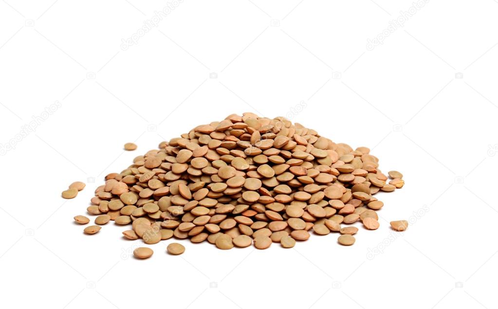 Handful of lentils isolated on white background