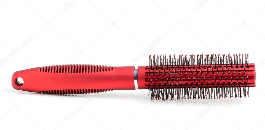 Round red hair brush.