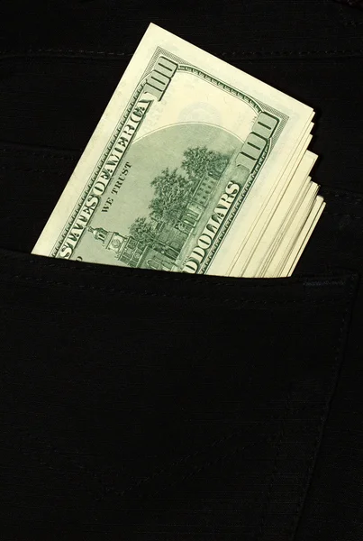 Des billets de 100 dollars sortent de la poche — Photo