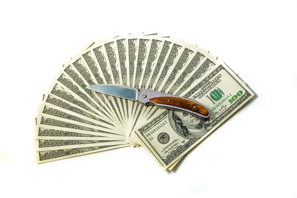 100 dollar bills fan stack and knife — Stock Photo, Image