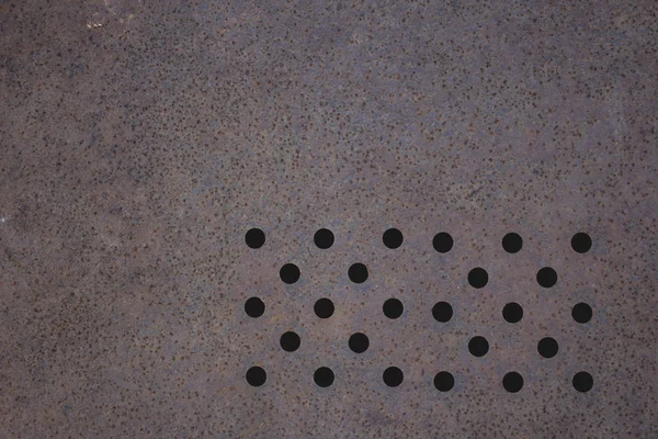 Texture of rusty metal with holes — Stock Photo, Image