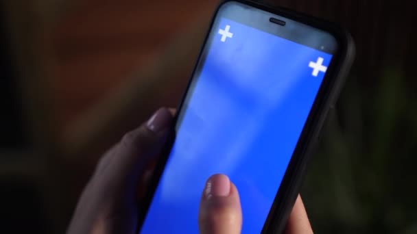 Close up shots of female fingers swipe left and right on blue screen application — Stock Video
