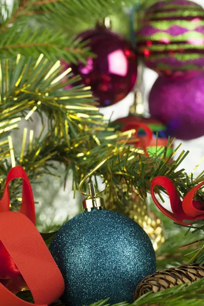 Decorations on the Christmas tree and near the tree — Stock Photo, Image