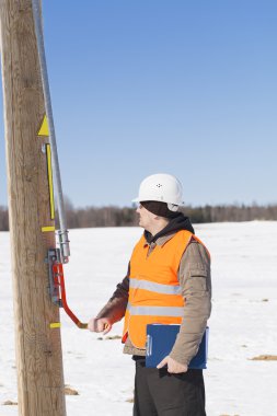 Electrical engineer inspect electric line dis connector