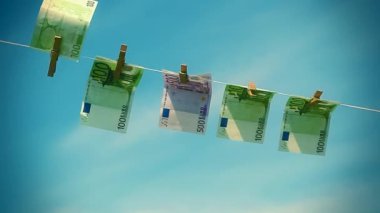 Rüzgar mavi gökyüzü arka plan asılı euro banknot ip