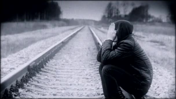 Depressed boy on the railway episode 1 — Stock Video
