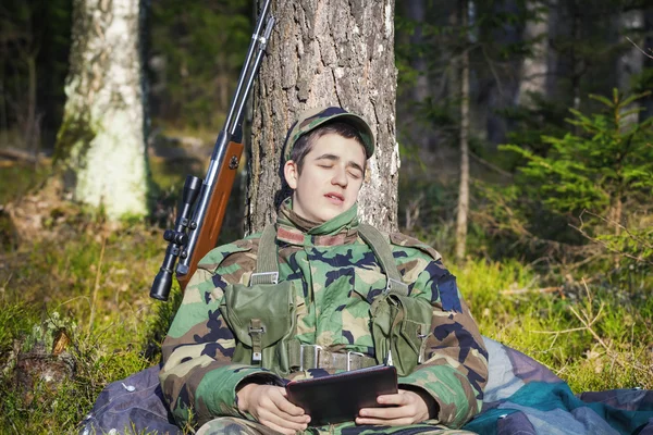 Sleeping recruit with tablet PC — Stock Photo, Image
