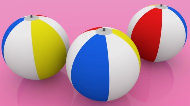 Pembe üzerine üç renkli plaj topu.
