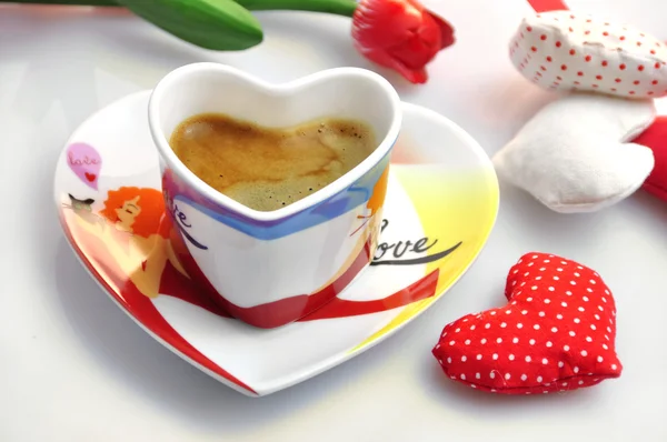 Valentine - cup of coffee with cloth hearts — Stock Photo, Image