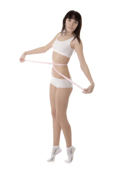 Chica midiendo su cintura —  Fotos de Stock