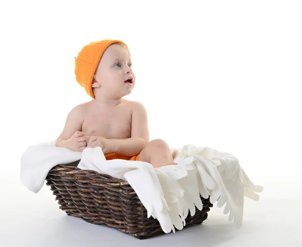 Child dressed as a pumpkin on a white background — Stock Photo, Image