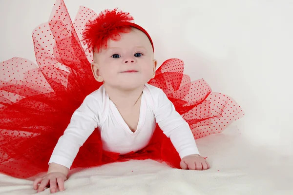 Menina em uma saia bonita e headband Imagem De Stock