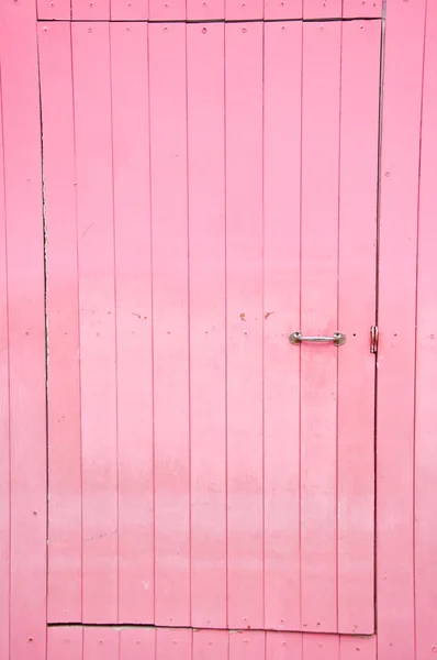 Old pink wood door — Stock Photo, Image