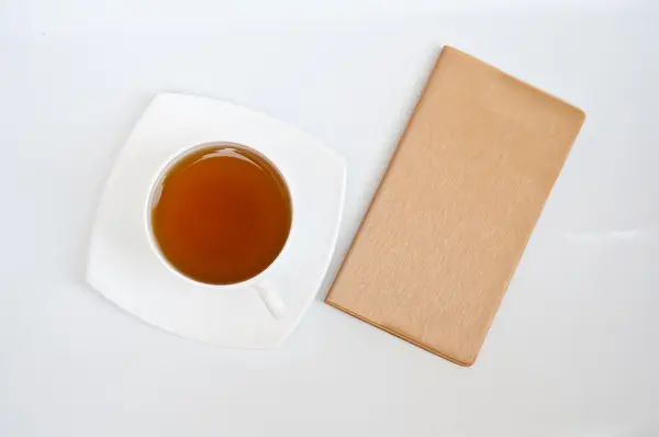 Tea and notebook — Stock Photo, Image