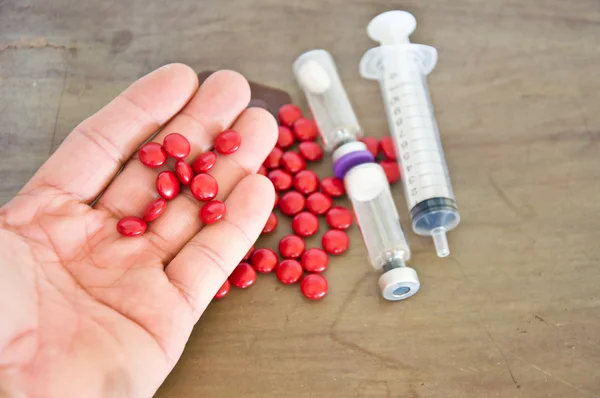 Red drug — Stock Photo, Image