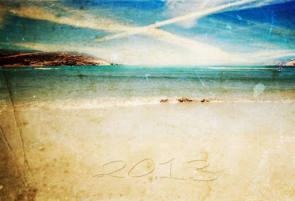 Zbliża się nowy rok 2013 - nadchodzi numery zapisane w piasku na egzotyczne beachnew rok 2013 - numery zapisane w piasku na plaży egzotycznego — Zdjęcie stockowe