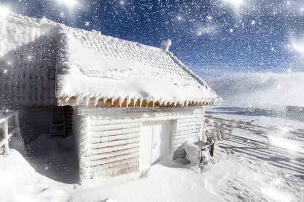 Christmas background with fairytale house in the mountains — Stock Photo, Image