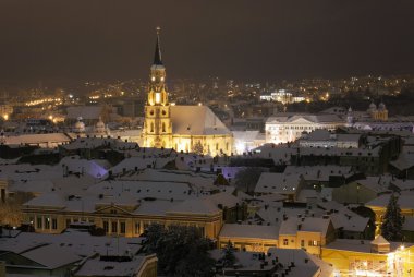 Night city view with St. Michael's Cathedral in Cluj, Romania clipart